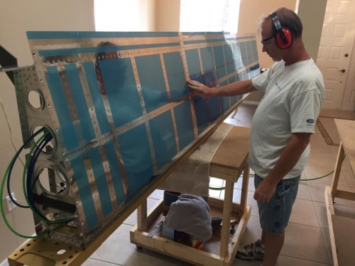 Finished riveting top wing.