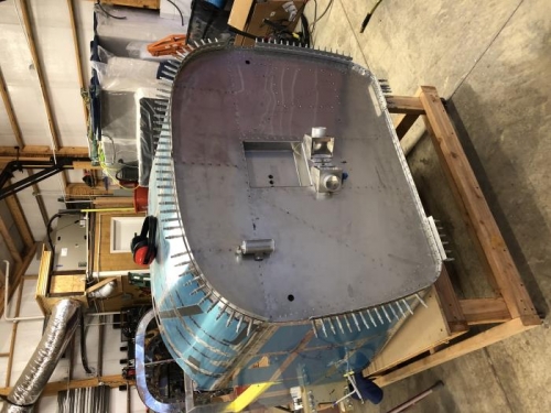 Top sides fully riveted and hinge pins fabricated and drilled