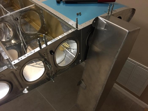 work continues on mounting the L wing AUX fuel tank