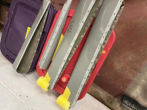 epoxied washer in behind where pulled rivets will go in fiberglass