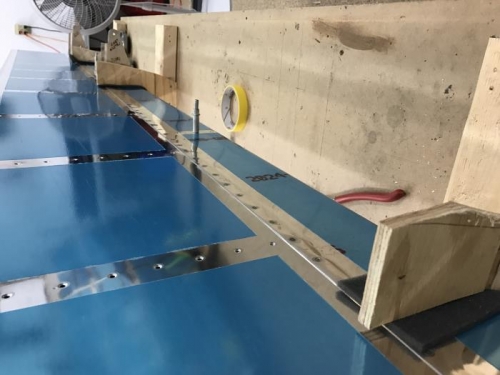 L and R flap bottom spar riveted...PITA to get to buck them