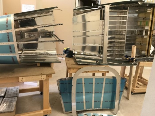 Taken apart, deburred, dimpled, countersunk, etc.