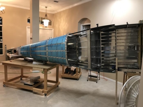 tailcone riveted to fwd fuse...it's big in the living room