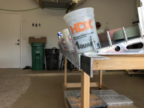 riveted together front of flap and pro-sealed rear edge.  Straight!