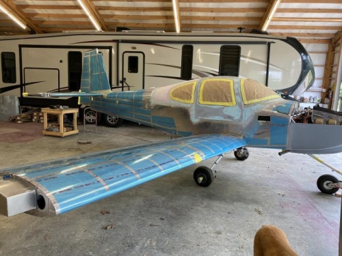 tail is back on and 1 wing is being connected