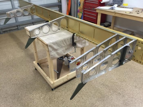 Some priming, riveteting, deburring progress L wing