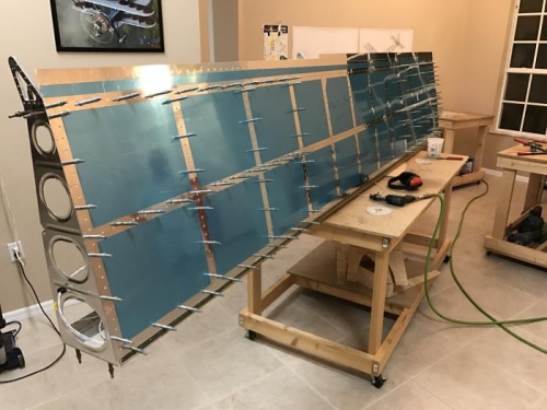 More riveting top wing.  Drilling, deburring and dimpling bottom skin