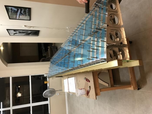 Rear spar attached and top wing skins drilled