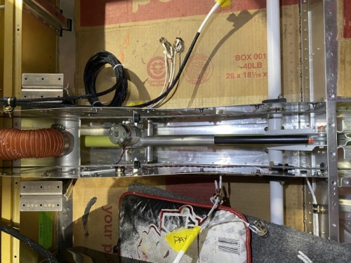 flap actuator under tunnel