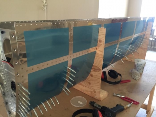 Riveting L wing outer leading edge