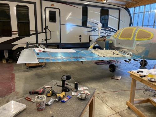 L wing tip, light, aileron, and flap are mounted here