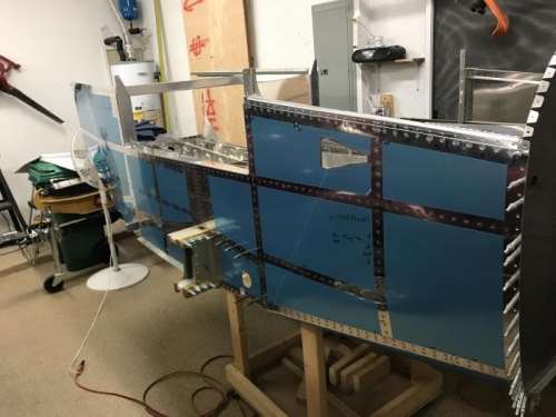 One side riveted...finishing fwd other side to go