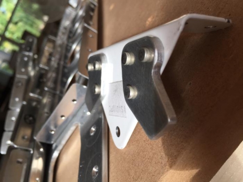 First driven rivets on rudder stops