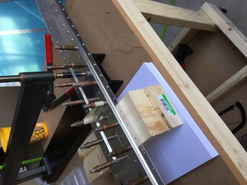 C frame riveting rear spar