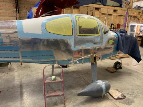 More filler on body and began the gear fairings