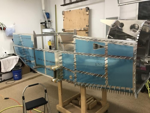 Progress on riveting R side skin