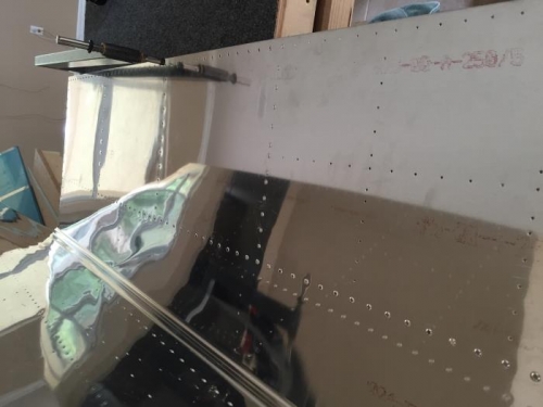 Deburring and dimpling horiz stab