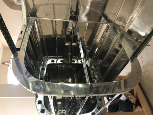 dimpled, deburred, and nut plates installed