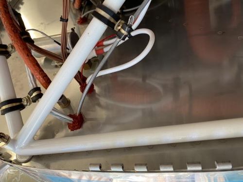 RTV sealant on the firewall penetrations today