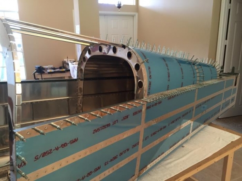 More riveting of aft fuselage