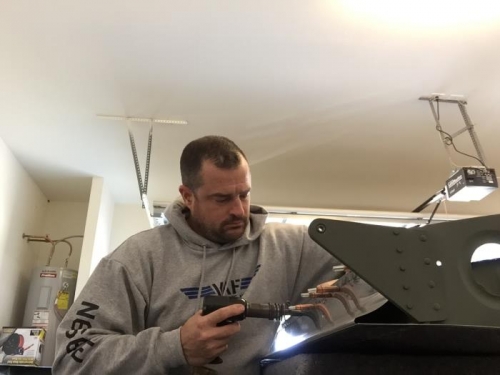 Closing the aileron gap seal to the aft spar