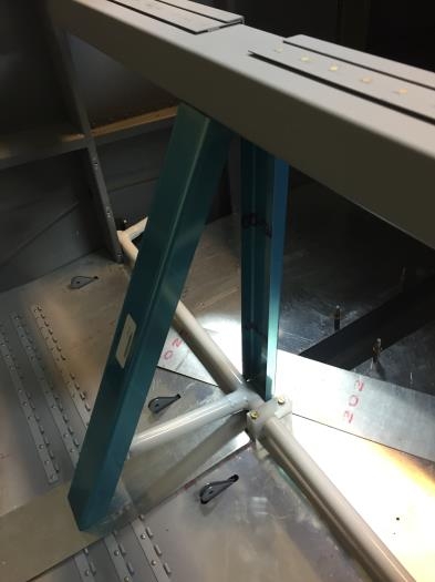 Trimmed to length and angled to fit under cross brace!