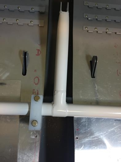 Drilled to floor rib through floor panels!