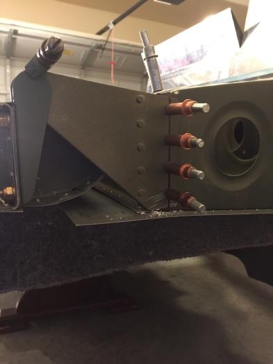 Outboard ens of rear spar aileron bracket