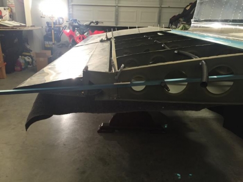 Straight edge with tooling holes in main rib