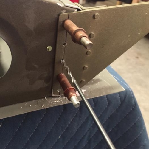 Match drilling brackets to rear spar