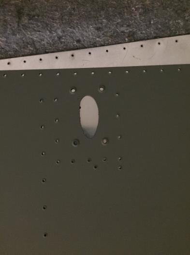 The lower two holes under the bracket