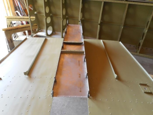 Ramp clecoed to riveted sides