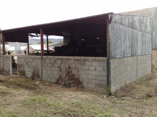 Sheeting removed. Wall height to be raised