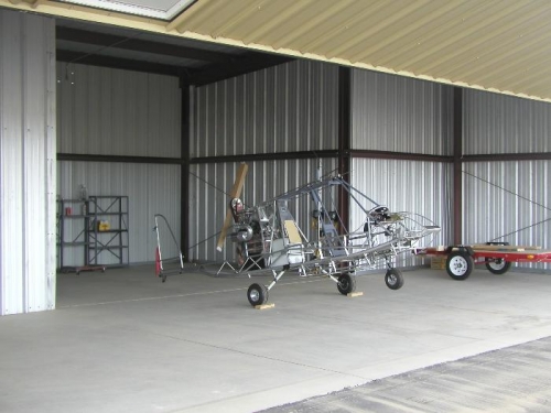 Plane and trailer in hangar