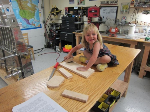 Amelia, sanding away.