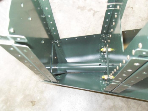 After installing the keeper rivets and riveting on the skin the tail spring mount gap drew up nice.