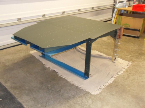 With a friend's help we banged out the skin rivets.