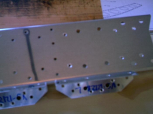 Countersink holes in rear spar and caps