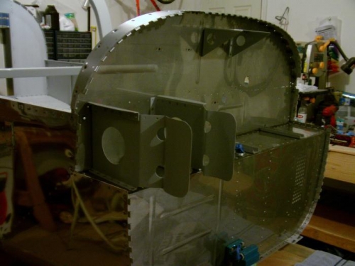 Braces Riveted to Upper Firewall