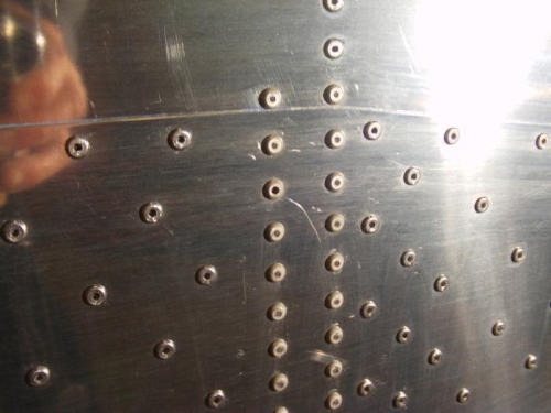 Rivet Not Fully Set (3rd from top)