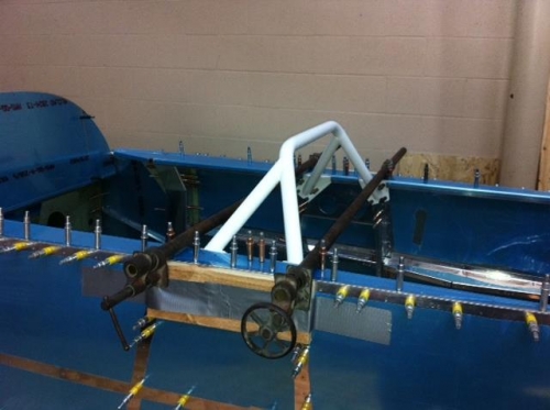 Squeezing fuselage sides to ensure proper e/d in parts