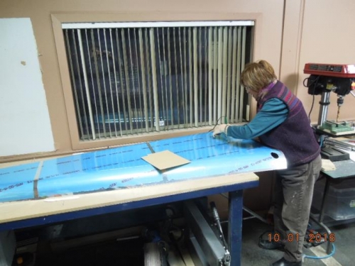 She developped her own technics for straight film removal on curve surface !