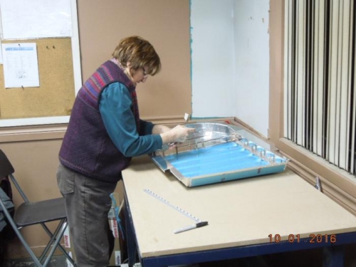 Mom learning how to use the Cleco pliers !