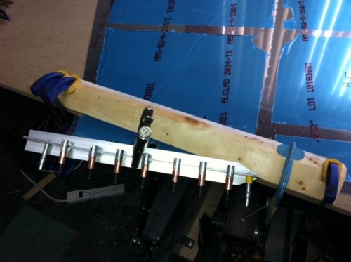 LH skin F823 aft bottom corner roll