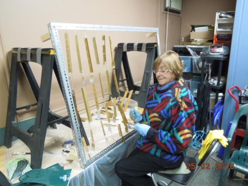 Mom racking parts prior to paint