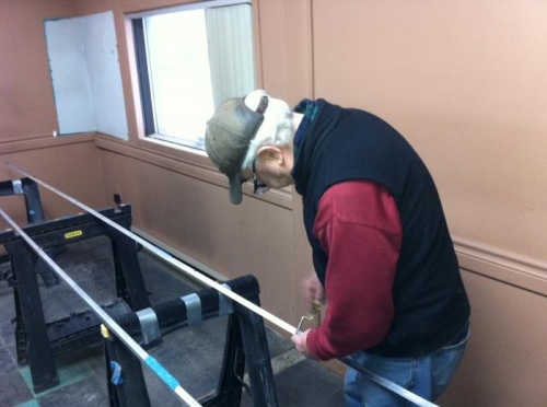 Dad learning how to hole deburr