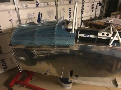 Left side of forward top skin