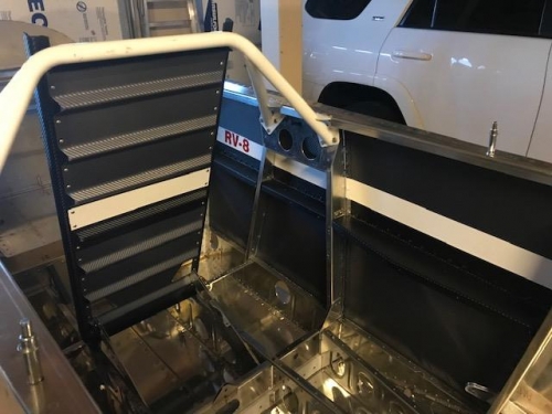 Front seatback sitting in place on upright fuselage