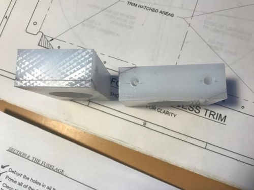 Mounting blocks for flap arm