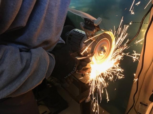 Grinding visegrip edges for a hand riveting tool